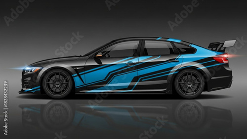 Sleek black sports sedan with dynamic blue graphic wrap and custom modifications.