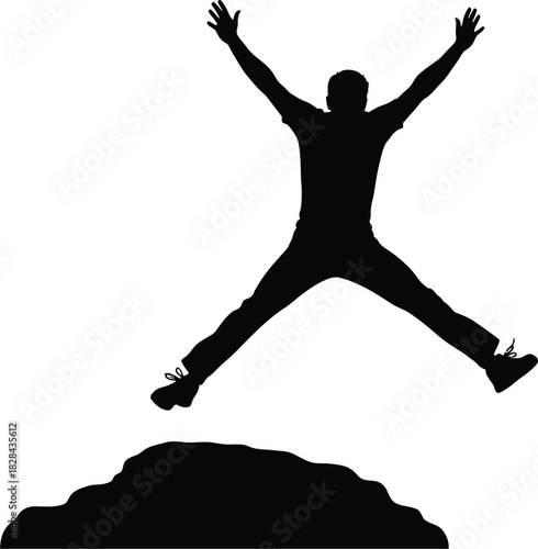 Silhouette of a person jumping with arms spread