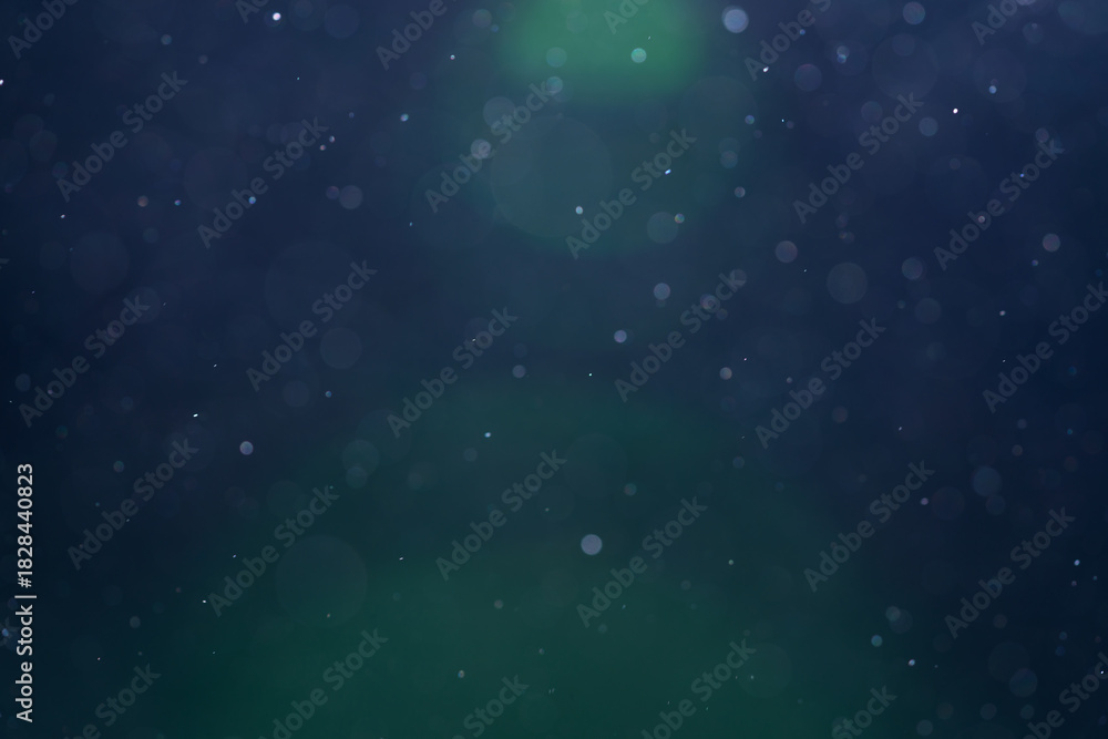 Fototapeta premium backlit real dust particles with lens flare