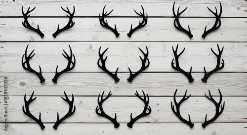 Collection of Antler Silhouettes Arranged on Rustic Wooden Background for Hunting and Wildlife Design Projects and Creative Applications with a Nature Theme