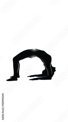 Silhouette of person performing a deep backbend yoga pose against a bright white background