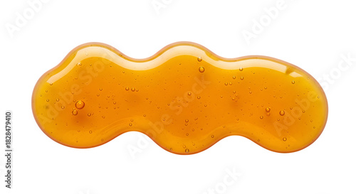 Golden honey drop on black background sweet and natural food product
