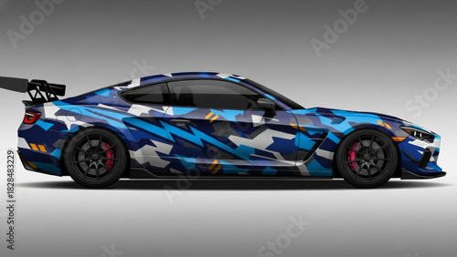 Blue camouflage sports car with spoiler, side view.