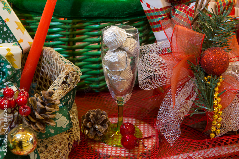 Fototapeta premium Merry Christmas composition. New year, Christmas gifts, red basket, fir branches, gift packages, decorations.