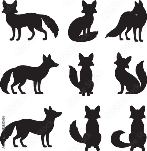 Collection of black fox silhouettes in various standing and sitting poses for wildlife nature graphic design