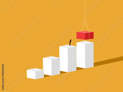 Businessman creates a staircase to success