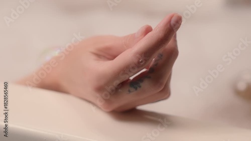 Wallpaper Mural Close up Caucasian woman female hand touching foam soap bubble unrecognizable girl lady relax in foamy bath home bathtub resting atmosphere skincare self-care relaxing beauty procedure calm tranquil Torontodigital.ca