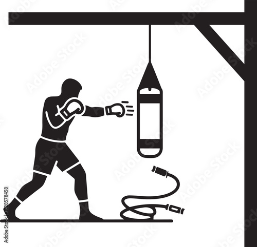 Boxer punching a heavy bag with jump rope boxing training