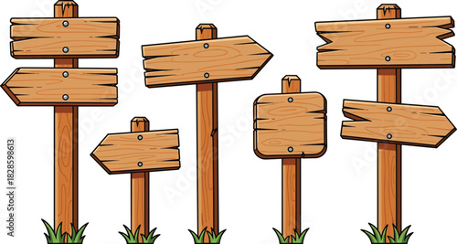 Collection of wooden signposts with directional arrows and blank signs directional sign