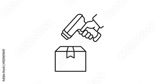 A hand holding a scanner scanning a cardboard box, ready for shipping.
