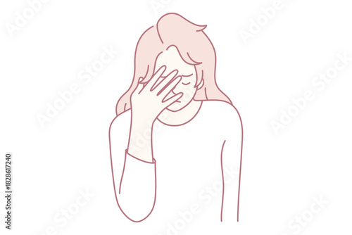 woman covering face with hand in frustration and visible stress, candid emotional moment showing regret