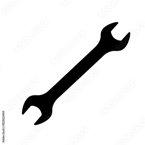 Black silhouette of a wrench isolated on white background