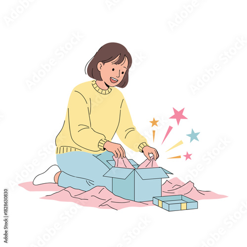 Excited woman unpacking gift box while sitting on the floor  