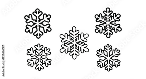 Set of Five Intricate Snowflake Icons in Black and White.