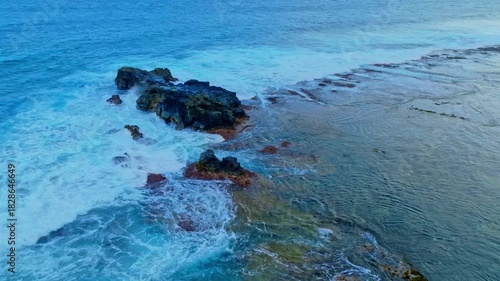 Aerial view Coastal Waves and Cloudscape with the tropical shoreline waves background