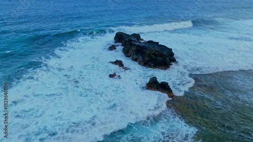 Aerial view Coastal Waves and Cloudscape with the tropical shoreline waves background