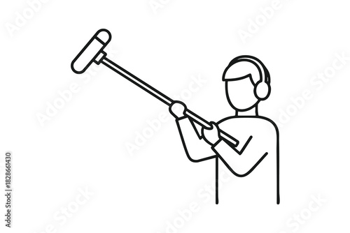 Boom Operator Recording Sound for Film Production