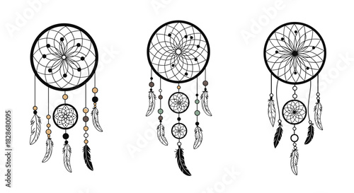 Set of three intricate bohemian dreamcatchers with feathers and beads in a spiritual native american style for decoration.