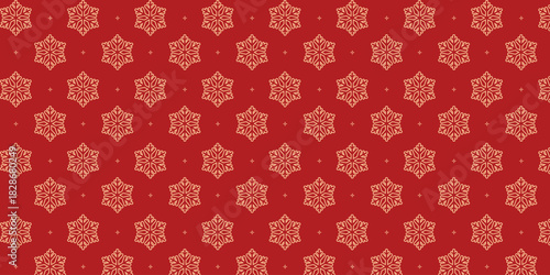 Elegant seamless pattern with golden snowflakes and tiny stars on a rich red background, perfect for Christmas wrapping paper, festive textiles, greeting cards, invitations and seasonal holiday design