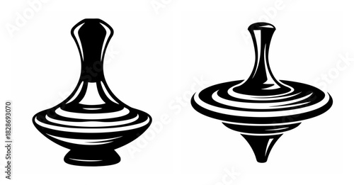 Two classic spinning tops side by side showing their distinct shapes and contours