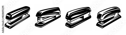A quartet of classic office staplers in a row displaying their sturdy metal construction and mechanical design for paper fastening tasks