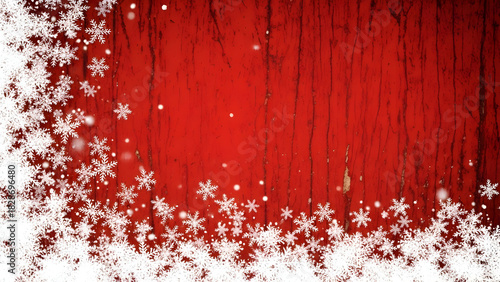 A festive Christmas background with a frosty border of white snowflakes on a rustic red wood texture.