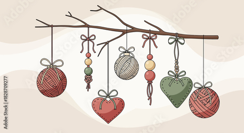 Handmade ornaments hanging from a tree branch creating a warm and cozy holiday decoration