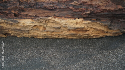 Pieces of weathered wood on the beach sand. Focus selected