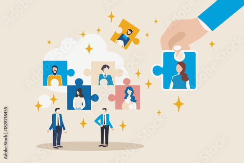Hand assembling a team puzzle with diverse people portraits and business people below