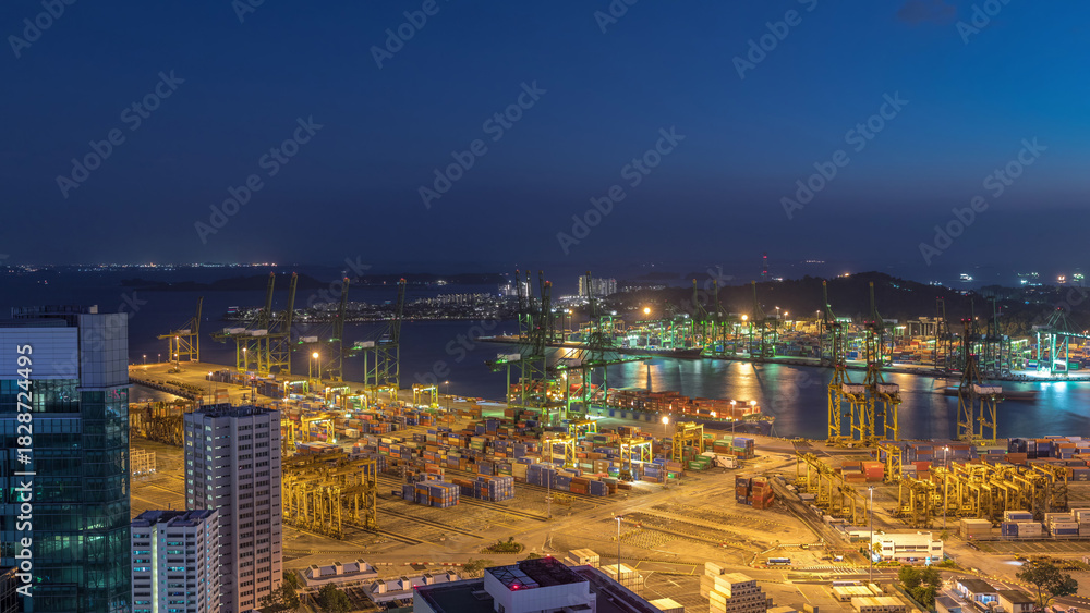 Fototapeta premium Commercial port of Singapore aerial day to night timelapse.