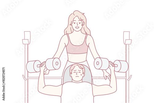 two athletes training with dumbbells woman spotting man man lying on bench pressing while female spotter supports weights focused coaching atmosphere gym equipment visible