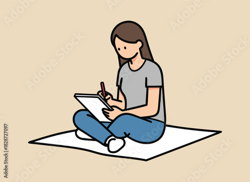Young woman drawing in a sketchbook with a pencil, sitting on mat.