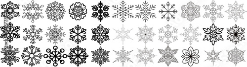 A collection of various snowflake designs in black and white showcasing different styles and patterns