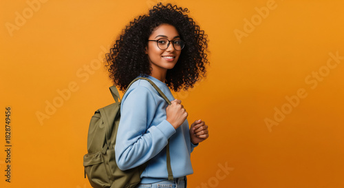 Happy African American Student Smiling with Backpack and Glasses