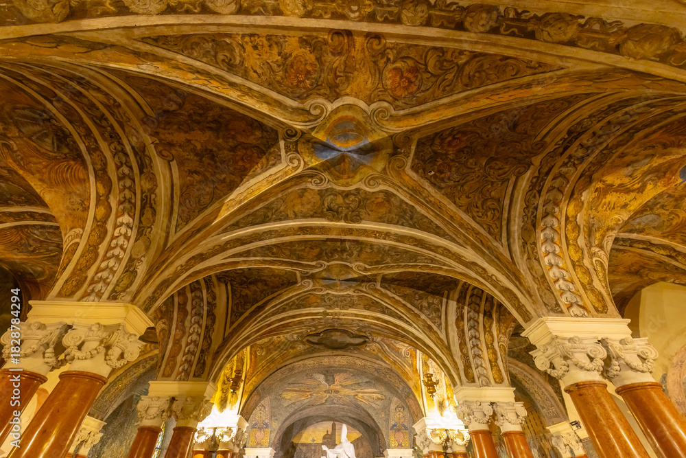 Naklejka premium Ornate vaulted ceiling with intricate frescoes in Ascoli Piceno, Italy
