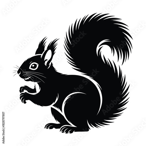 Black silhouette of a squirrel holding a nut with a bushy tail