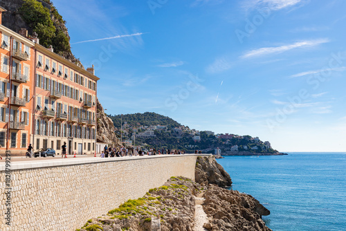 Fototapeta Naklejka Na Ścianę i Meble -  NICE, FRANCE - SEPTEMBER 28, 2025: Tourists and local people walking on the streets of Nice