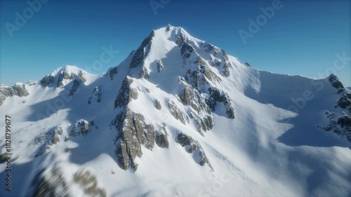 Majestic Snow- Covered Mountain Range Under a Clear Blue Sky mountains winter