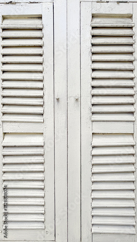 Close Up Window Shutters, Closed White Antique Wooden Casement Window at Nakhon Phanom, Thailand. 05 NOV 2025, A.M.