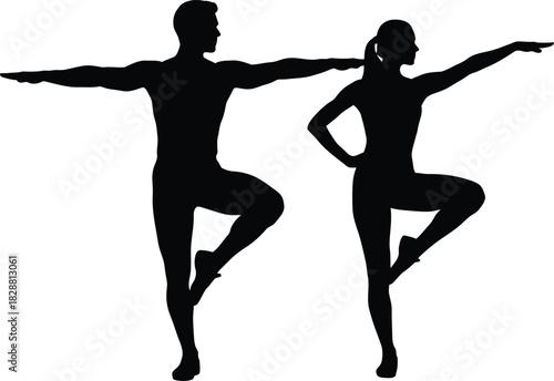 Silhouette of a man and woman performing a yoga pose
