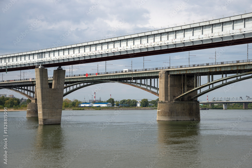 Fototapeta premium Fragments of two bridges over the Ob River. Novosibirsk. Russia