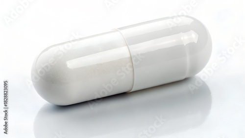 Single White Pharmaceutical Capsule on a White Reflective Surface with Soft Lighting