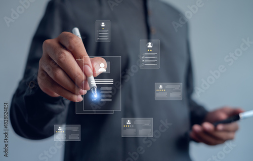 Person using a digital pen to manage virtual profile data and candidate information, representing modern HR technology, recruitment systems, digital screening, and smart workforce management.