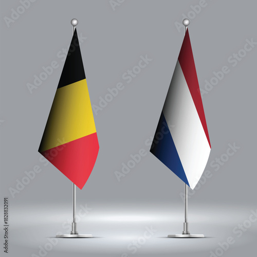 Two Standing Flags Representing Belgium vs Netherlands with Flags on Bodies 