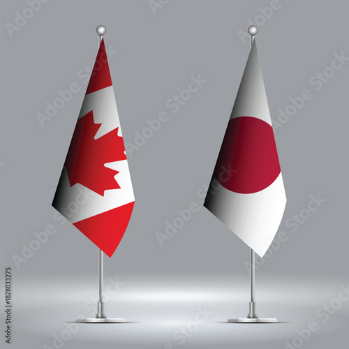 Two Standing Flags Representing Canada vs Japan with Flags on Bodies 