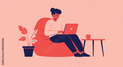 Young businessman working on a laptop at a desk in the office