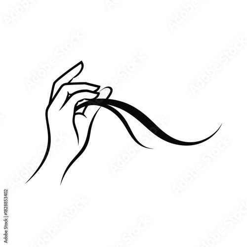 Elegant hand holding a strand of dark hair