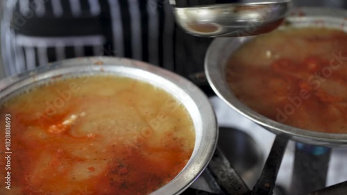 Close up view of cooking beyran soup in a restaurant kitchen. Beyran is a traditional Turkish soup with meat.