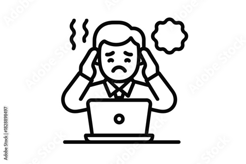 Stressed worker holding head in pain while sitting at desk with laptop
