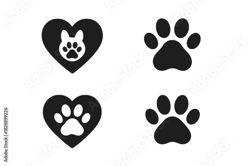 Black and white pet love symbols set with animal paw prints inside heart shapes and footprints